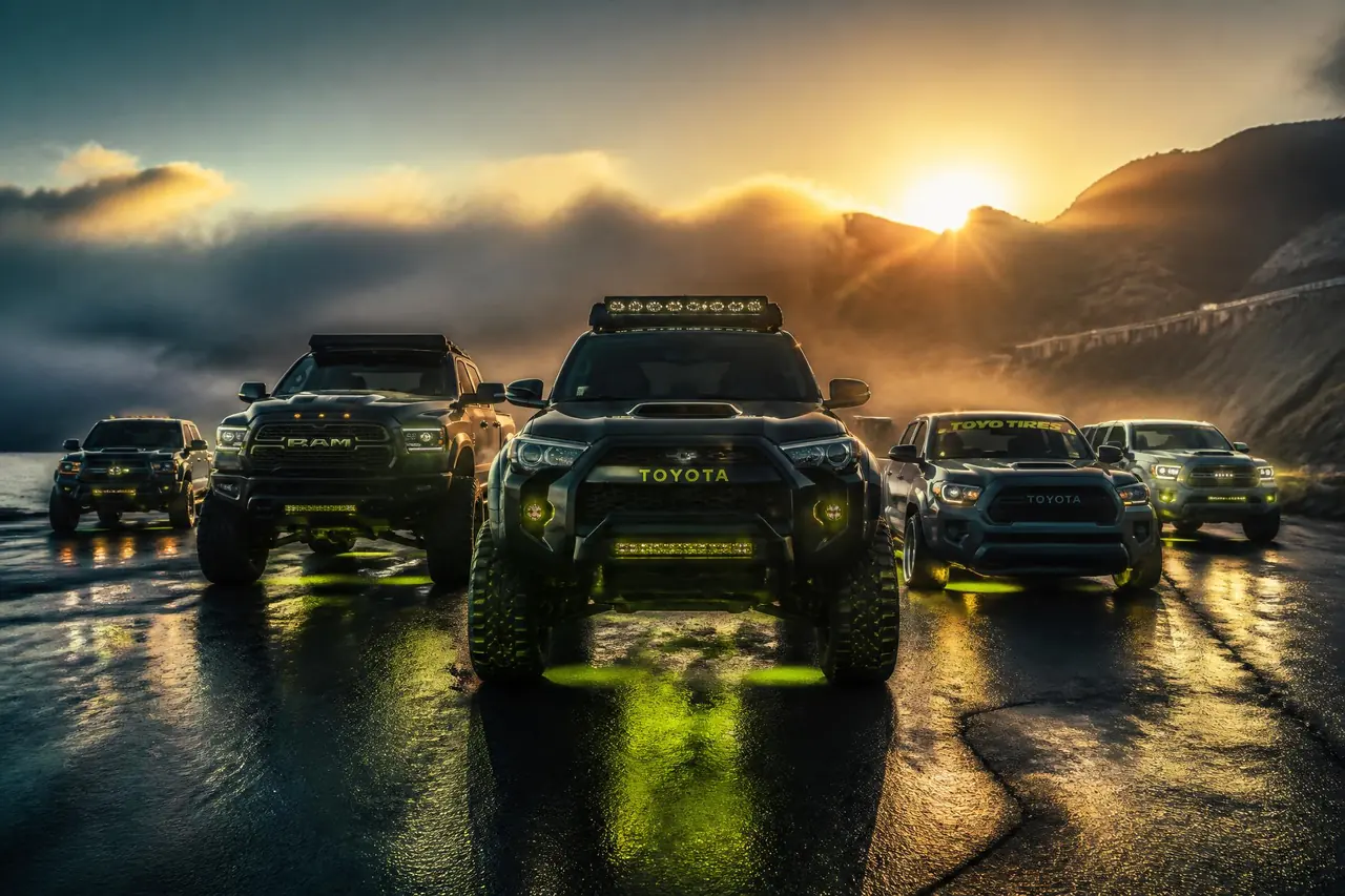 Lineup of custom lifted trucks built at the 831 Trucks shop in Hollister, California